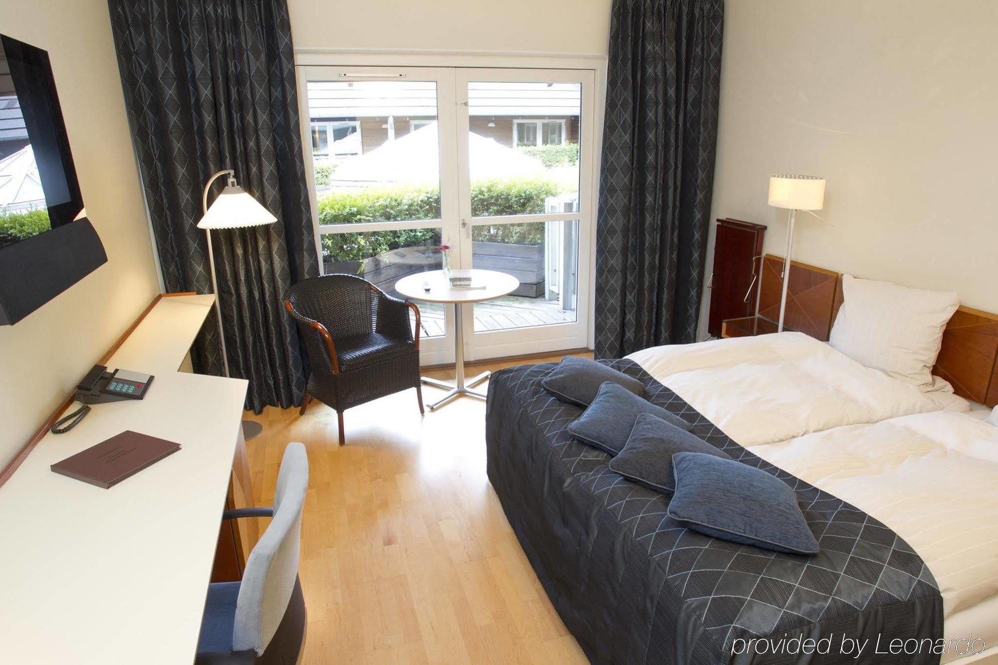 Hotel Comwell Kongebrogaarden à Middelfart Chambre photo